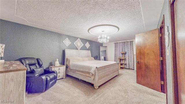 bedroom featuring light carpet, a textured ceiling, and a chandelier