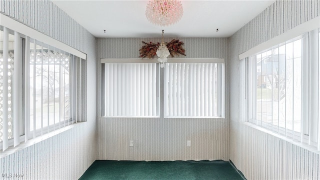 unfurnished sunroom with a healthy amount of sunlight