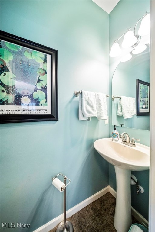 bathroom with tile patterned flooring