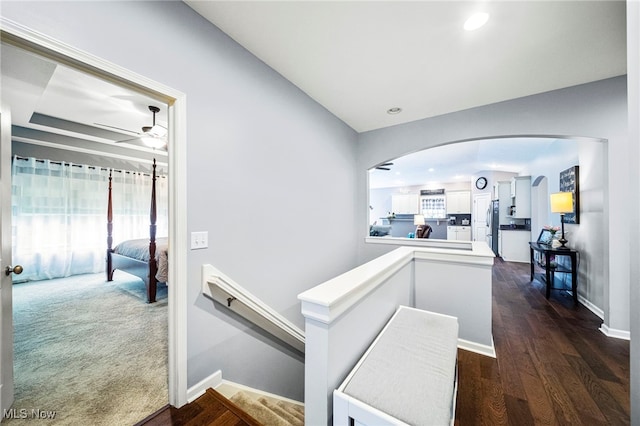 hall featuring dark wood-type flooring