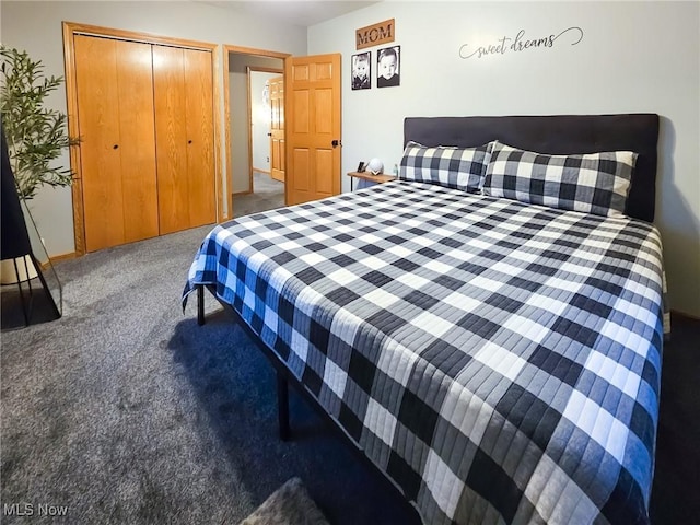 bedroom featuring a closet and carpet