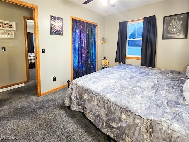 carpeted bedroom with ceiling fan and a closet