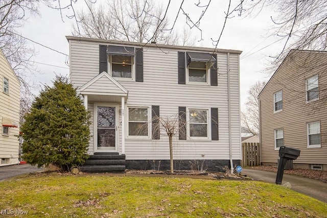 view of front of home with a front lawn