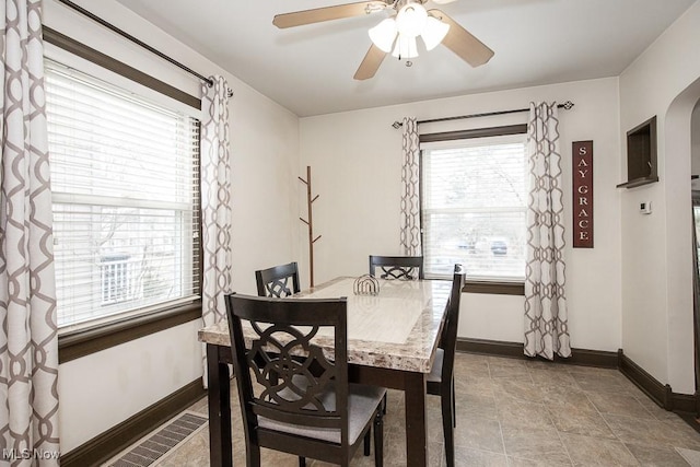 dining area with ceiling fan