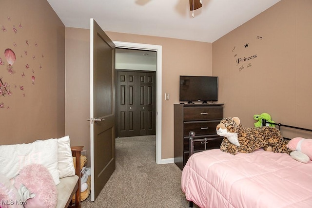 carpeted bedroom with ceiling fan