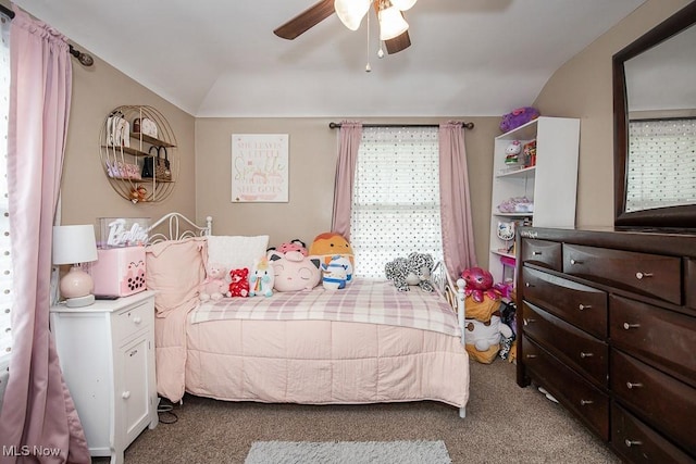 carpeted bedroom with lofted ceiling and ceiling fan