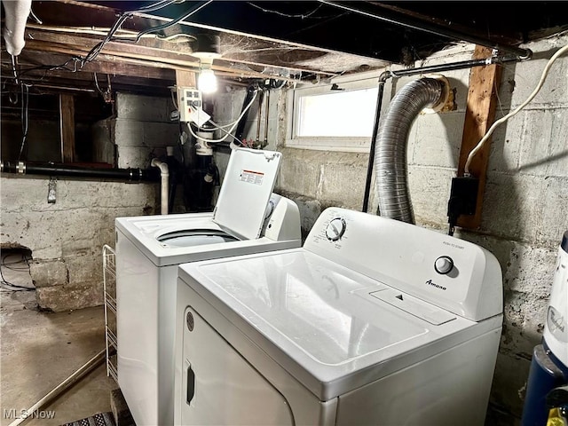 laundry room with separate washer and dryer