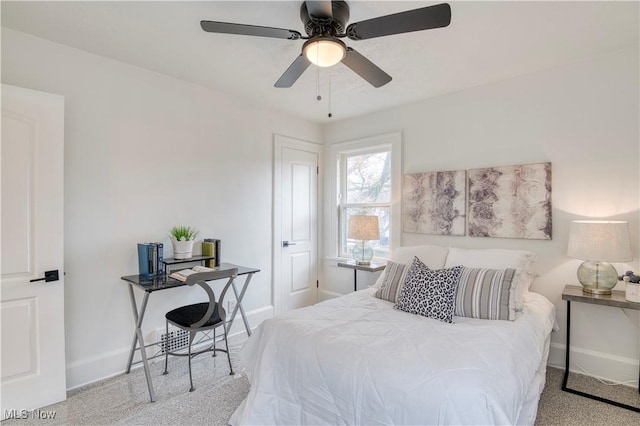 bedroom with light colored carpet and ceiling fan