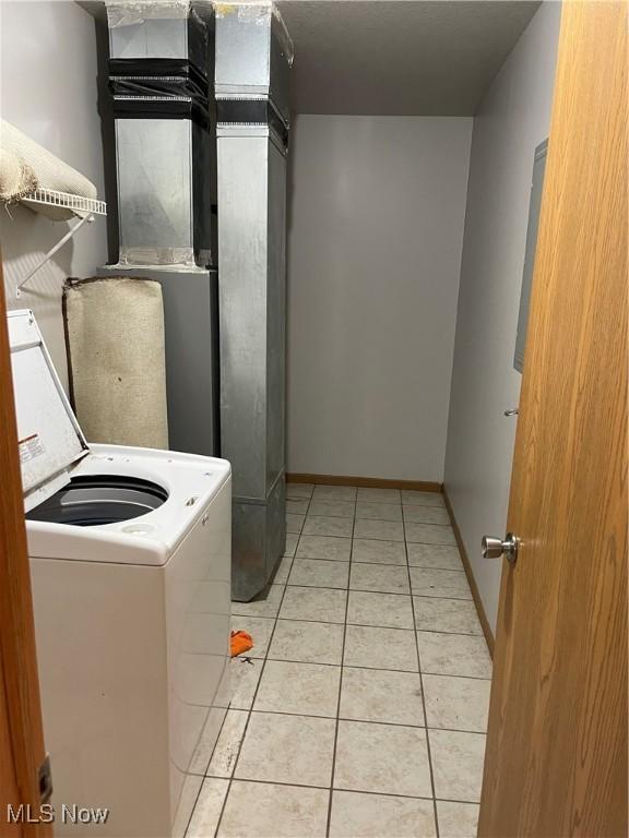 washroom featuring light tile patterned floors