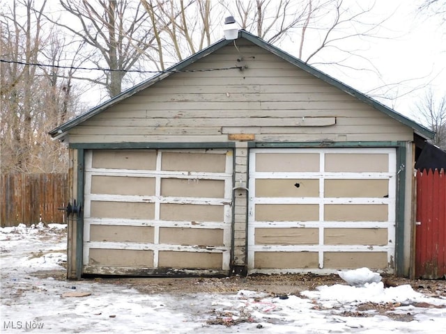 view of snow covered garage