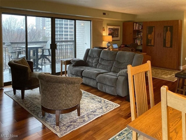 living room featuring dark hardwood / wood-style floors