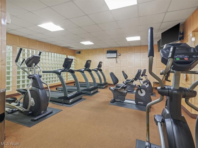 workout area with a drop ceiling