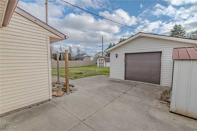 garage with a yard