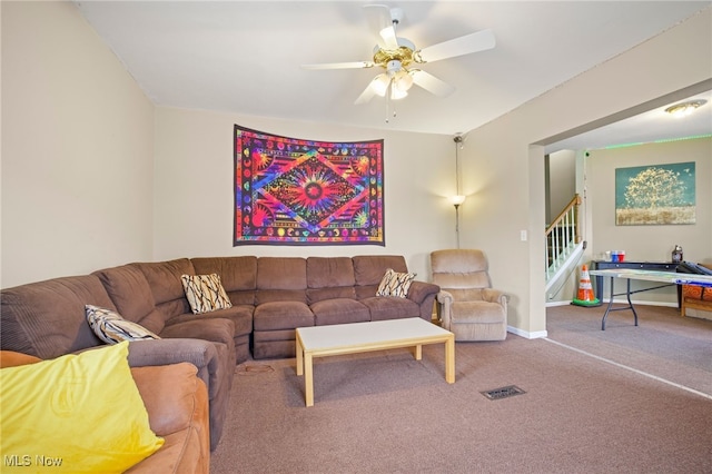 living room with carpet floors and ceiling fan