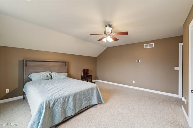 carpeted bedroom with lofted ceiling and ceiling fan