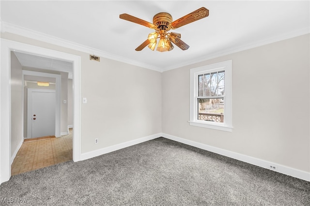 unfurnished room featuring crown molding, ceiling fan, and carpet flooring