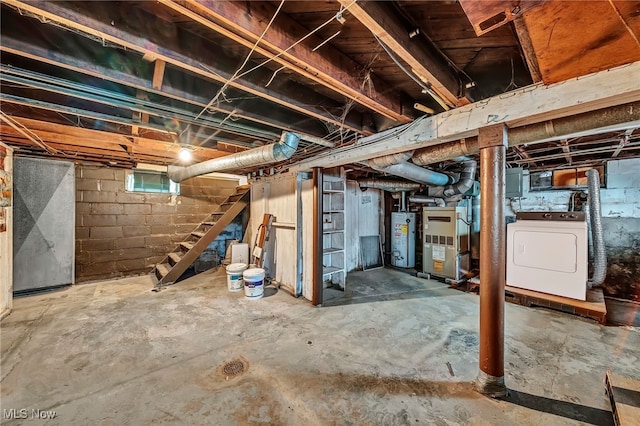 basement with washer / dryer, heating unit, and gas water heater