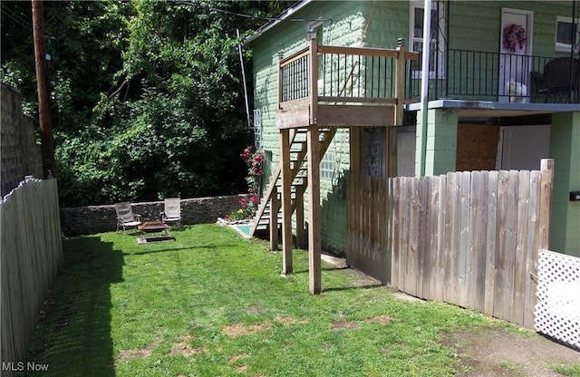 view of yard with an outdoor fire pit