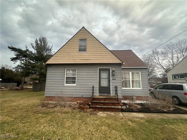 bungalow with a front lawn