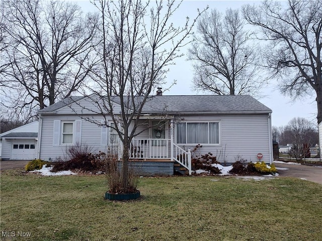 view of front of house with a porch and a front lawn