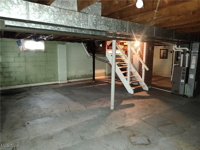 basement featuring heating unit