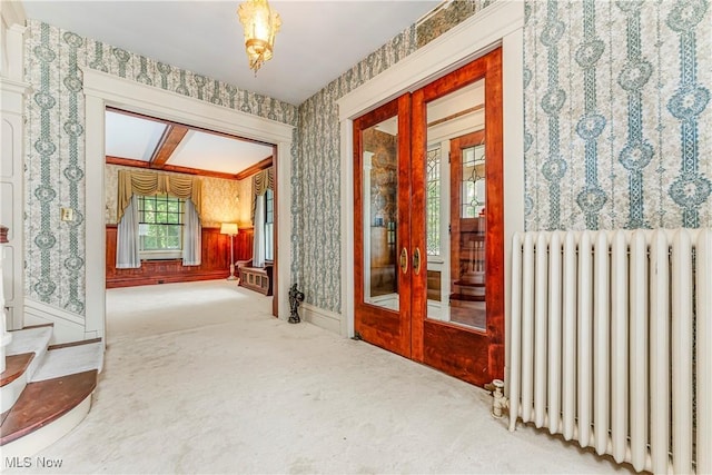 corridor with radiator heating unit and carpet