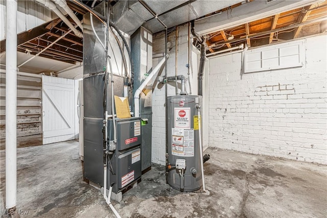 utility room with gas water heater and heating unit