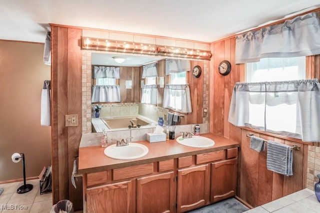 bathroom featuring vanity, wooden walls, and tile patterned flooring