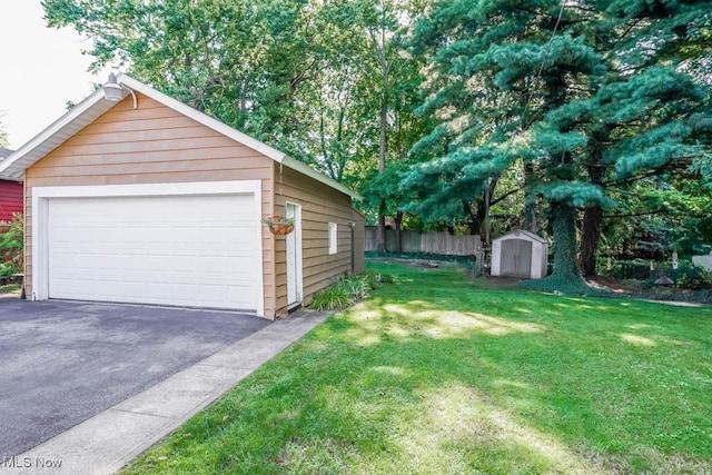 garage with a lawn