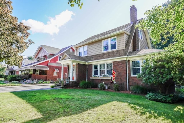 view of front of house with a front lawn