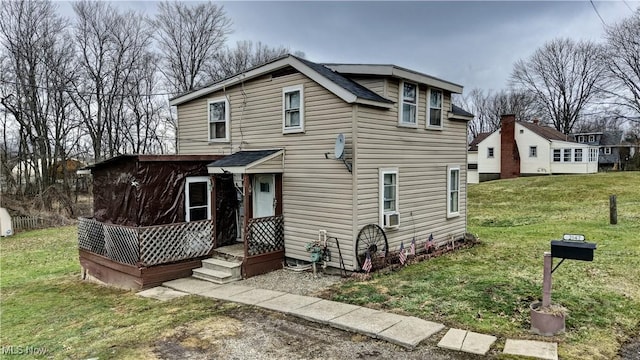 view of property with a front lawn