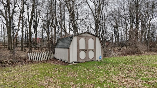 view of outdoor structure with a yard