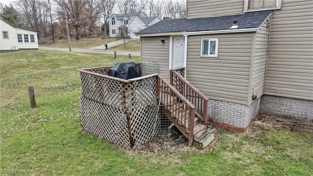 exterior space with area for grilling and a yard