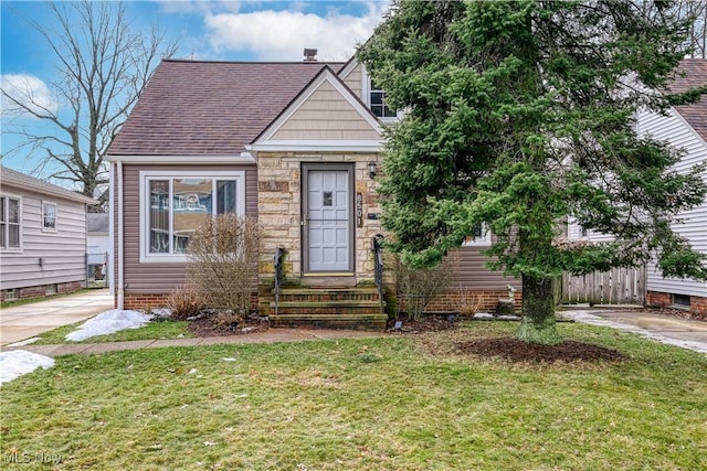 view of front of home with a front yard