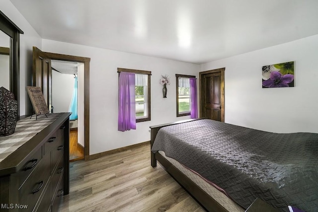 bedroom featuring light wood-type flooring