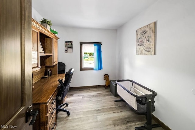 home office featuring light hardwood / wood-style flooring