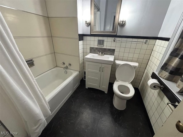 full bathroom featuring vanity, tile walls, shower / bath combination with curtain, and toilet