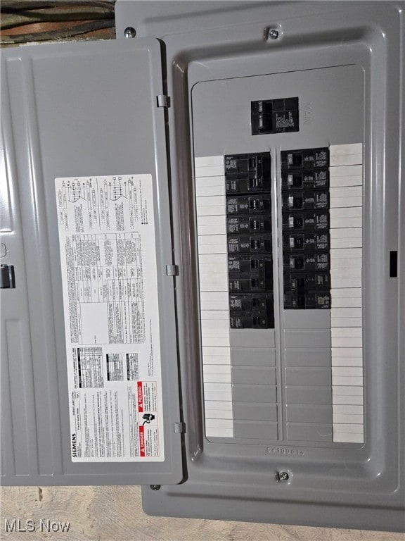 utility room featuring electric panel