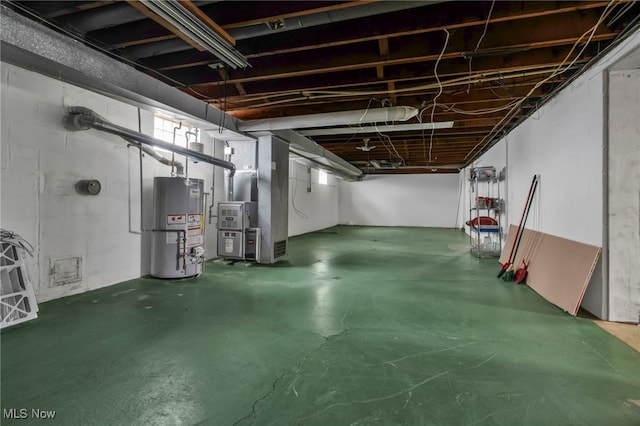 basement with heating unit and water heater