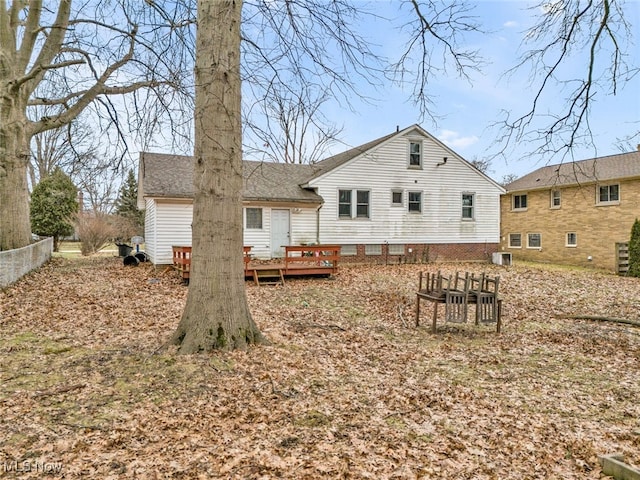 rear view of house with a deck