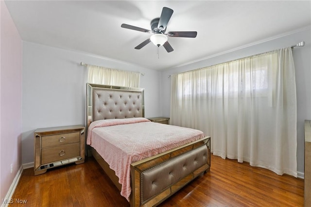 bedroom featuring dark wood-type flooring and ceiling fan