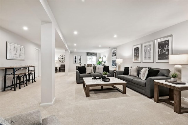 living room featuring light colored carpet