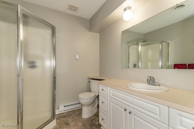 bathroom featuring walk in shower, vanity, toilet, and a baseboard heating unit