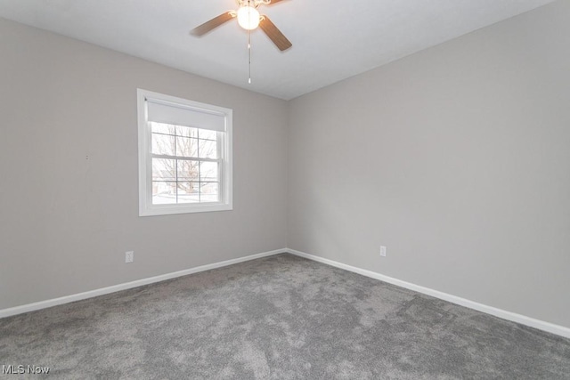 carpeted empty room with ceiling fan