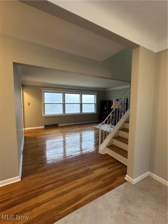 interior space with hardwood / wood-style floors