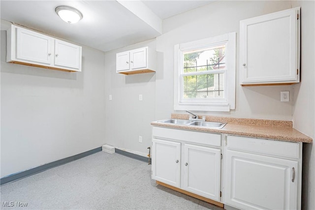 laundry area with sink