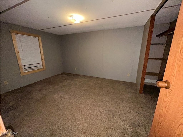 unfurnished room with carpet