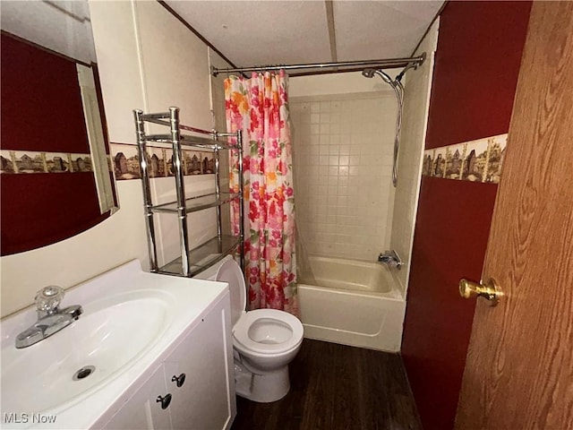 full bathroom with hardwood / wood-style flooring, vanity, toilet, and shower / bath combo