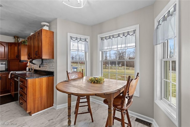 dining area with a healthy amount of sunlight