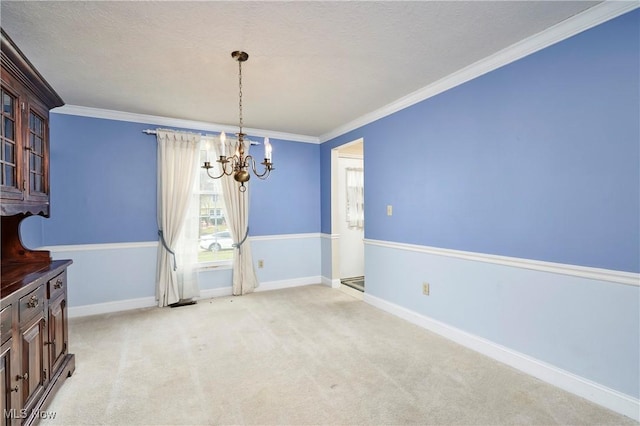 unfurnished dining area with crown molding, a textured ceiling, light carpet, and a notable chandelier